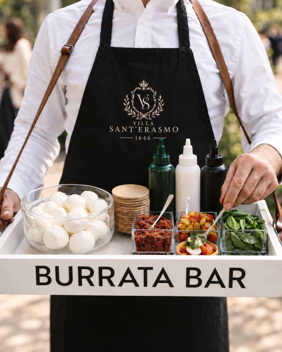 Banco della burrata con mozzarelle, pomodorini, basilico e condimenti, servizio aggiuntivo per matrimoni a Villa Sant'Erasmo